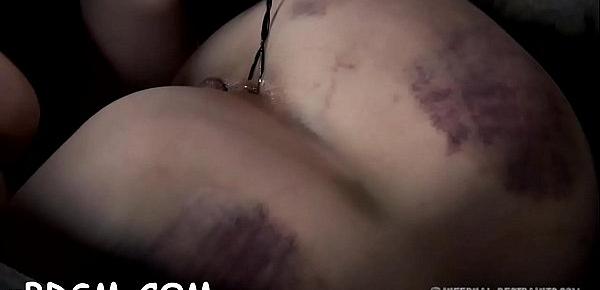  Pretty tied up sweetheart receives lusty whipping on her body